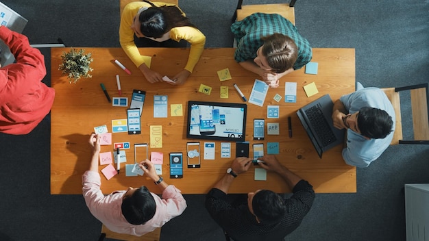 Two engineers reviewing documentation side by side